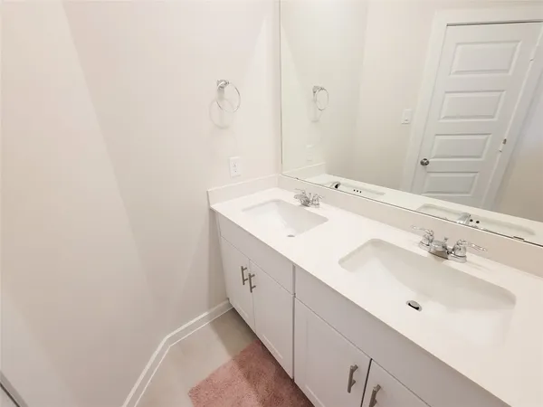 a bathroom with a sink a toilet and a bathtub