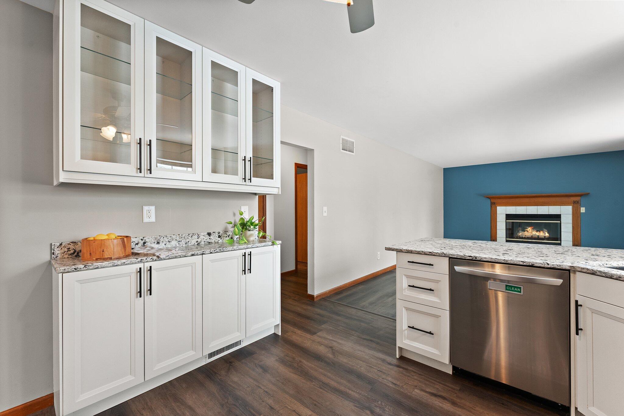 505 Wesley Road Kouts, IN 46347 - Photo 13 of 36 a kitchen with a stove and wooden floor