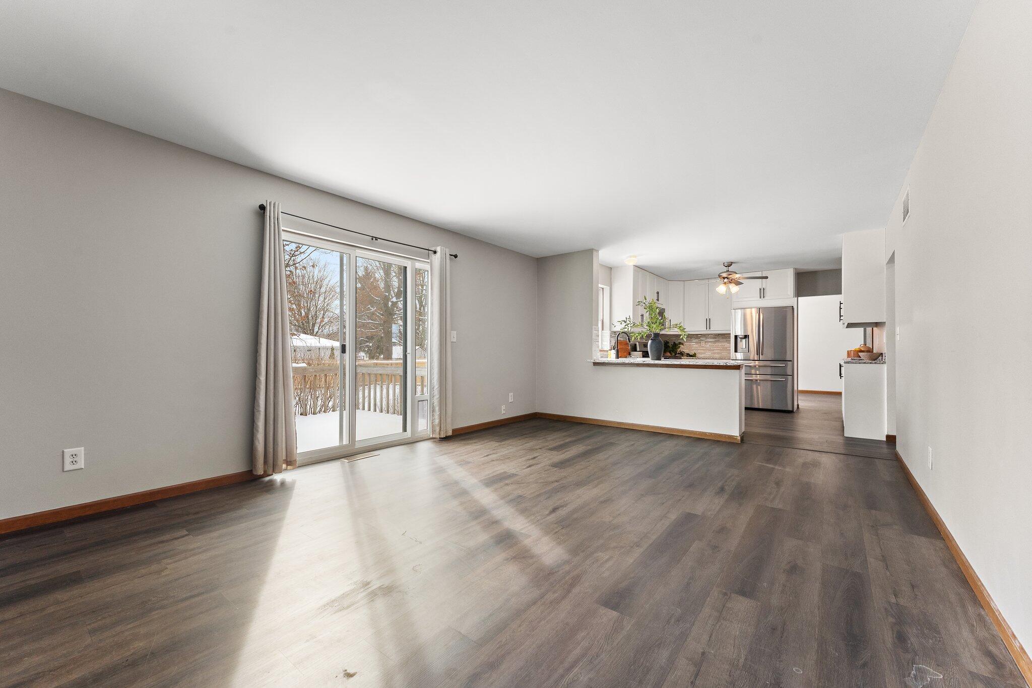 505 Wesley Road Kouts, IN 46347 - Photo 9 of 36 a view of a kitchen with wooden floor and a kitchen