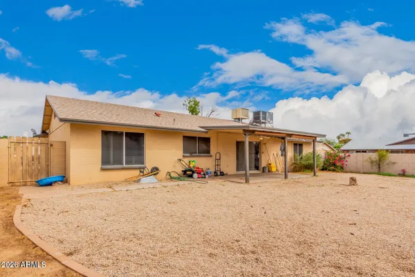 a front view of a house with a patio