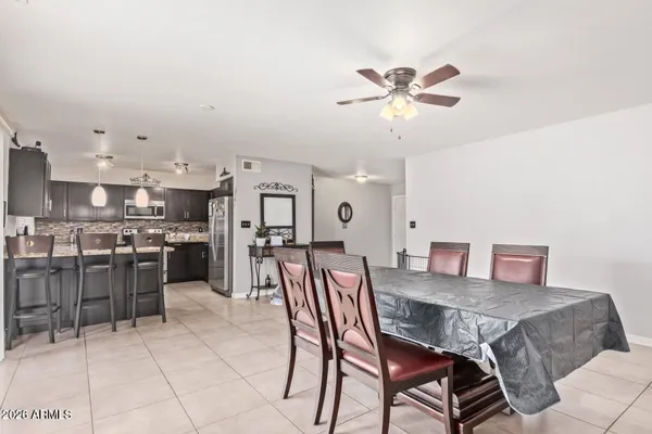 a view of a dining room with furniture