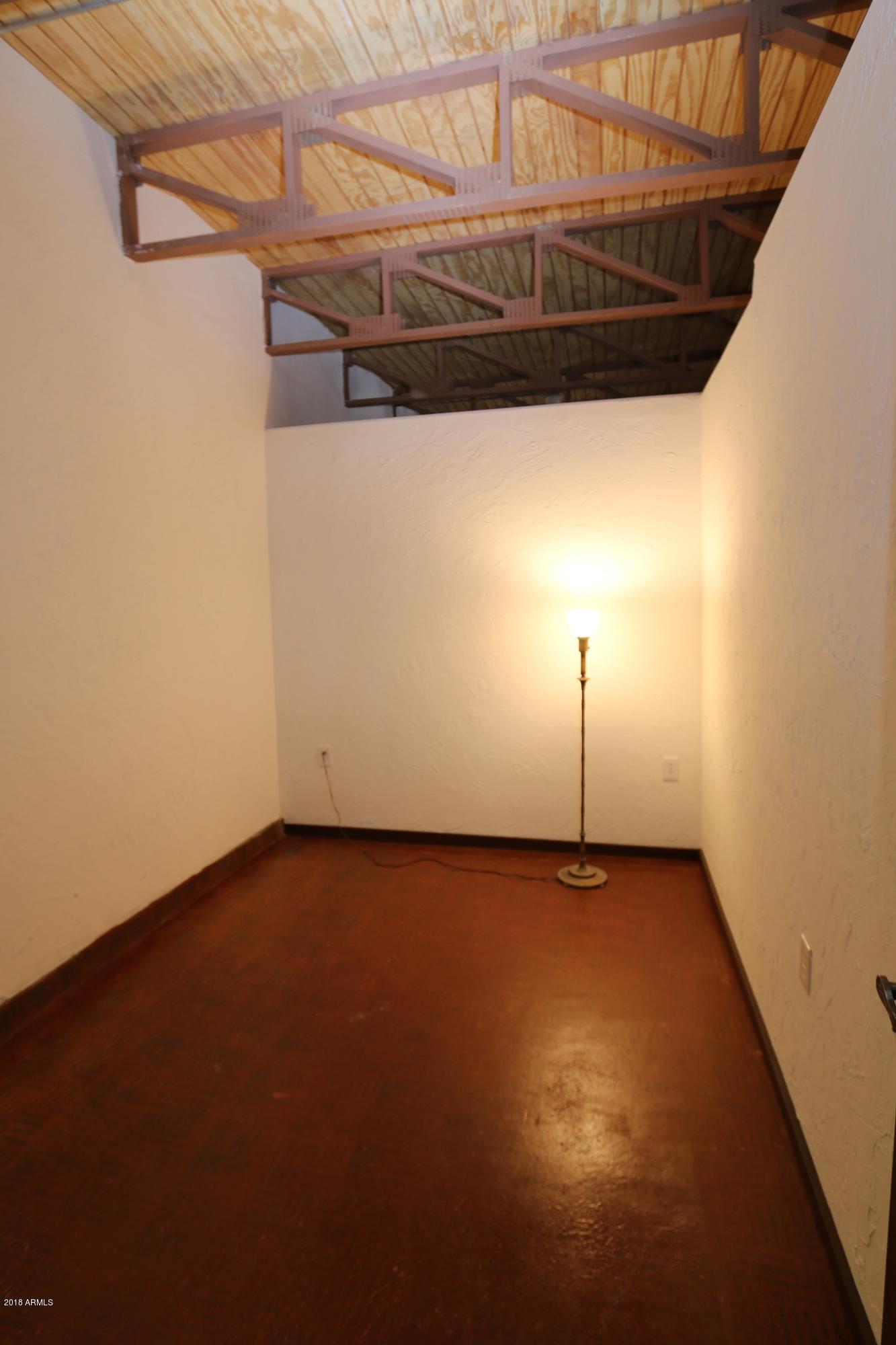 1730 East Lehi Road, Unit 2 Mesa, AZ 85203 - Photo 11 of 13 a view of a room with an empty space