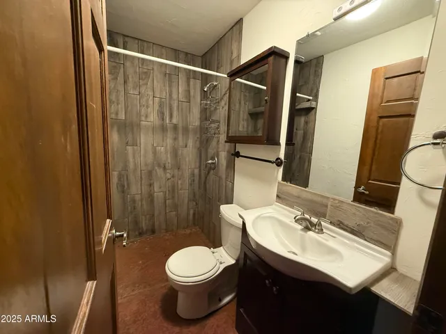 a view of a backyard of the house