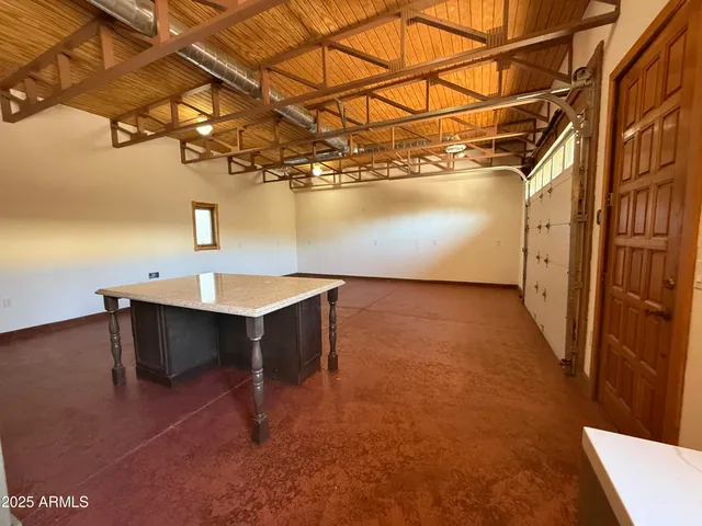 a view of a room with a sink and a window