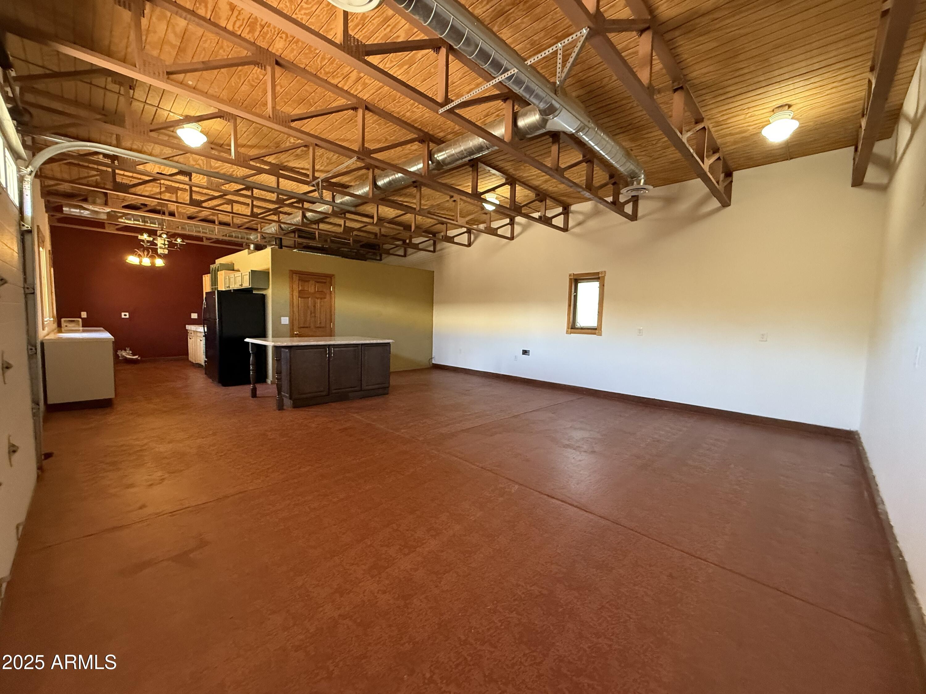 1730 East Lehi Road, Unit 2 Mesa, AZ 85203 - Photo 5 of 13 a view of a indoor garage