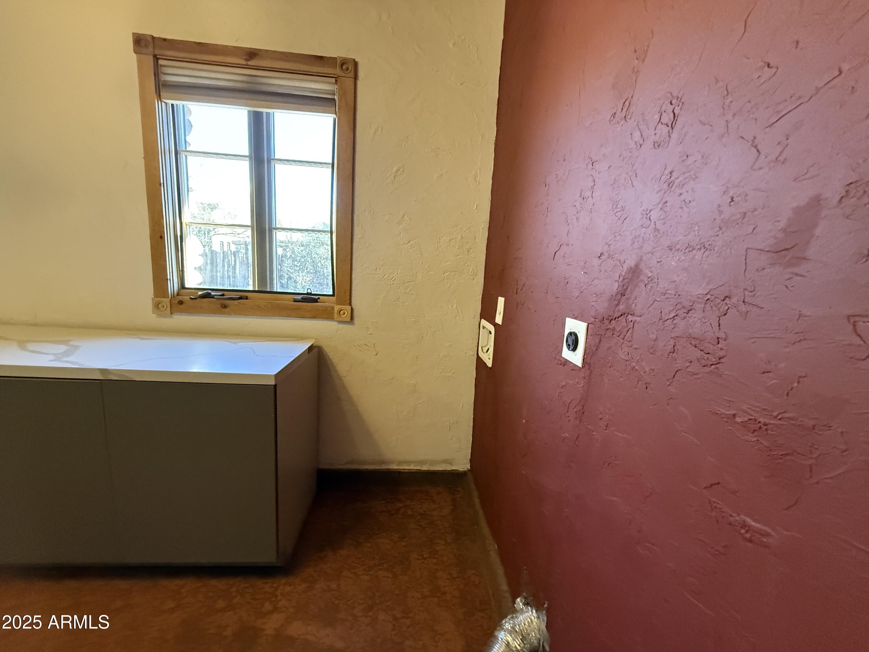 1730 East Lehi Road, Unit 2 Mesa, AZ 85203 - Photo 7 of 13 a view of a bathroom with a bathtub