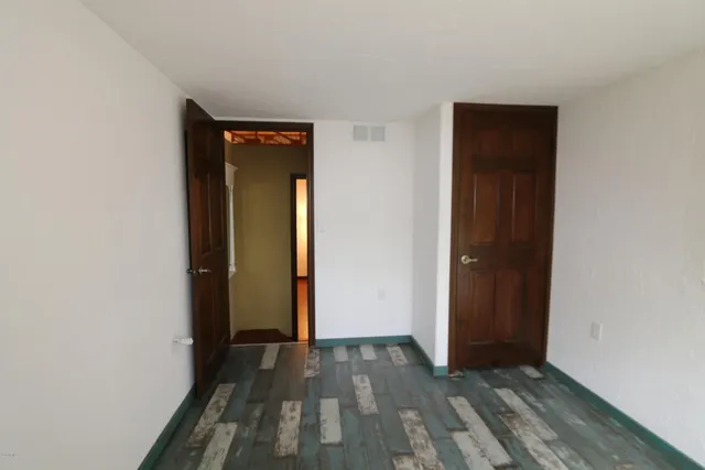 a view of a room with an empty space