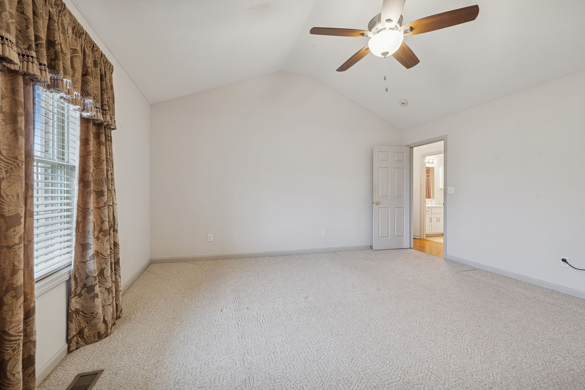 788 Long Creek Road Lafayette, TN 37083 - Photo 17 of 32 a view of an empty room with a window