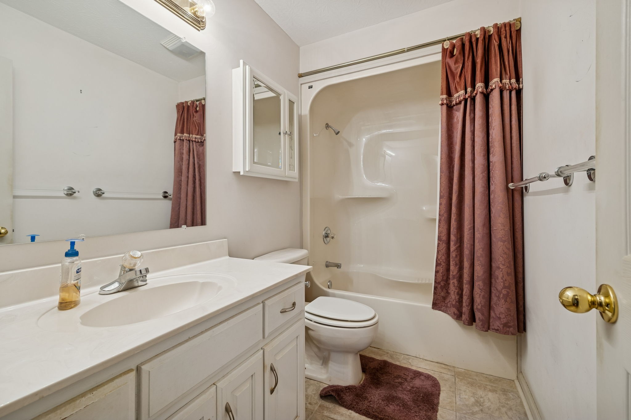 788 Long Creek Road Lafayette, TN 37083 - Photo 22 of 32 a bathroom with a sink a toilet and shower