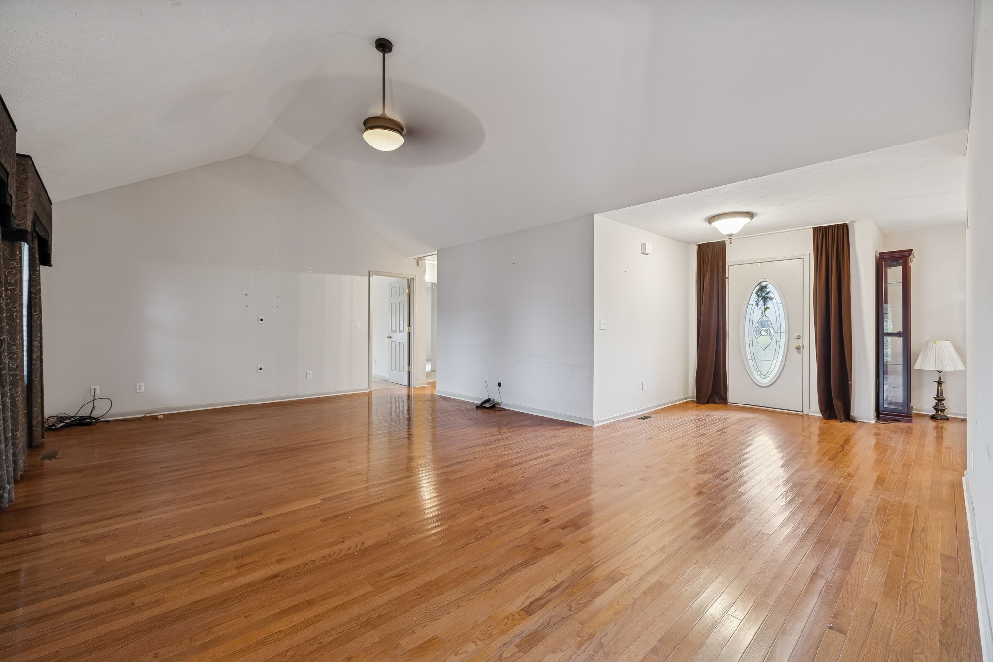 788 Long Creek Road Lafayette, TN 37083 - Photo 8 of 32 a view of a livingroom with wooden floor and a window