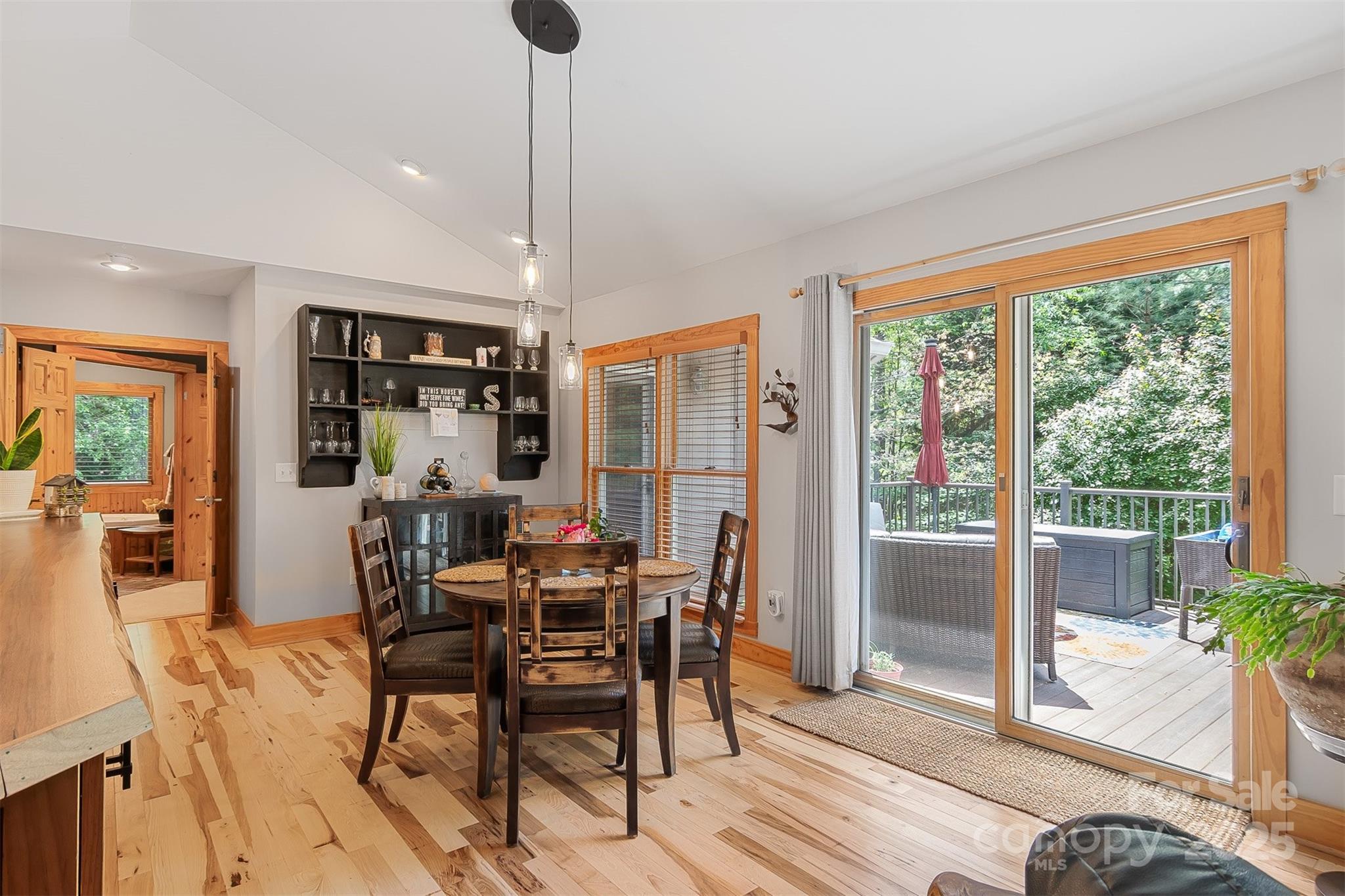5690 Anchor Drive Granite Falls, NC 28630 - Photo 11 of 48 a view of a dining room with furniture window and wooden floor