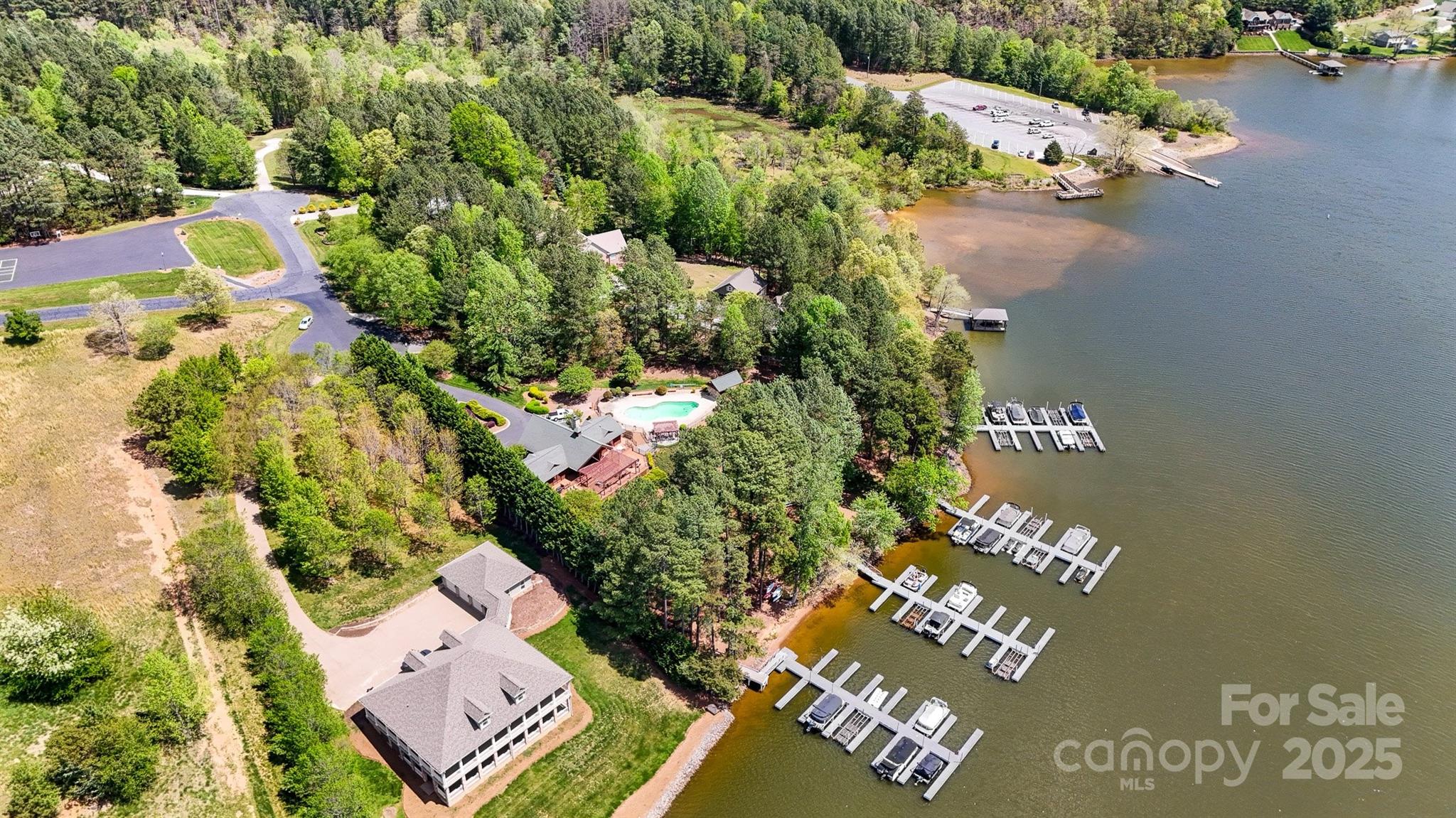 5690 Anchor Drive Granite Falls, NC 28630 - Photo 2 of 48 an aerial view of a house with a yard and garden