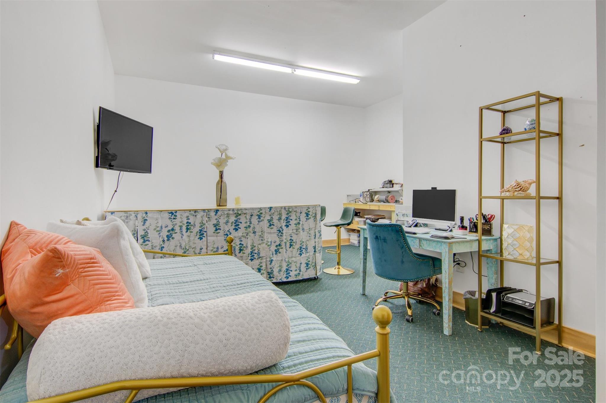 5690 Anchor Drive Granite Falls, NC 28630 - Photo 26 of 48 a bedroom with a bed and a tv