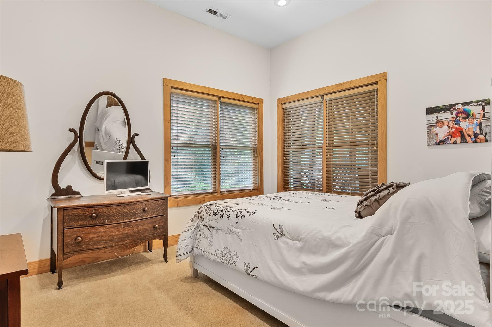 5690 Anchor Drive Granite Falls, NC 28630 - Photo 28 of 48 a bedroom with a bed and a large window