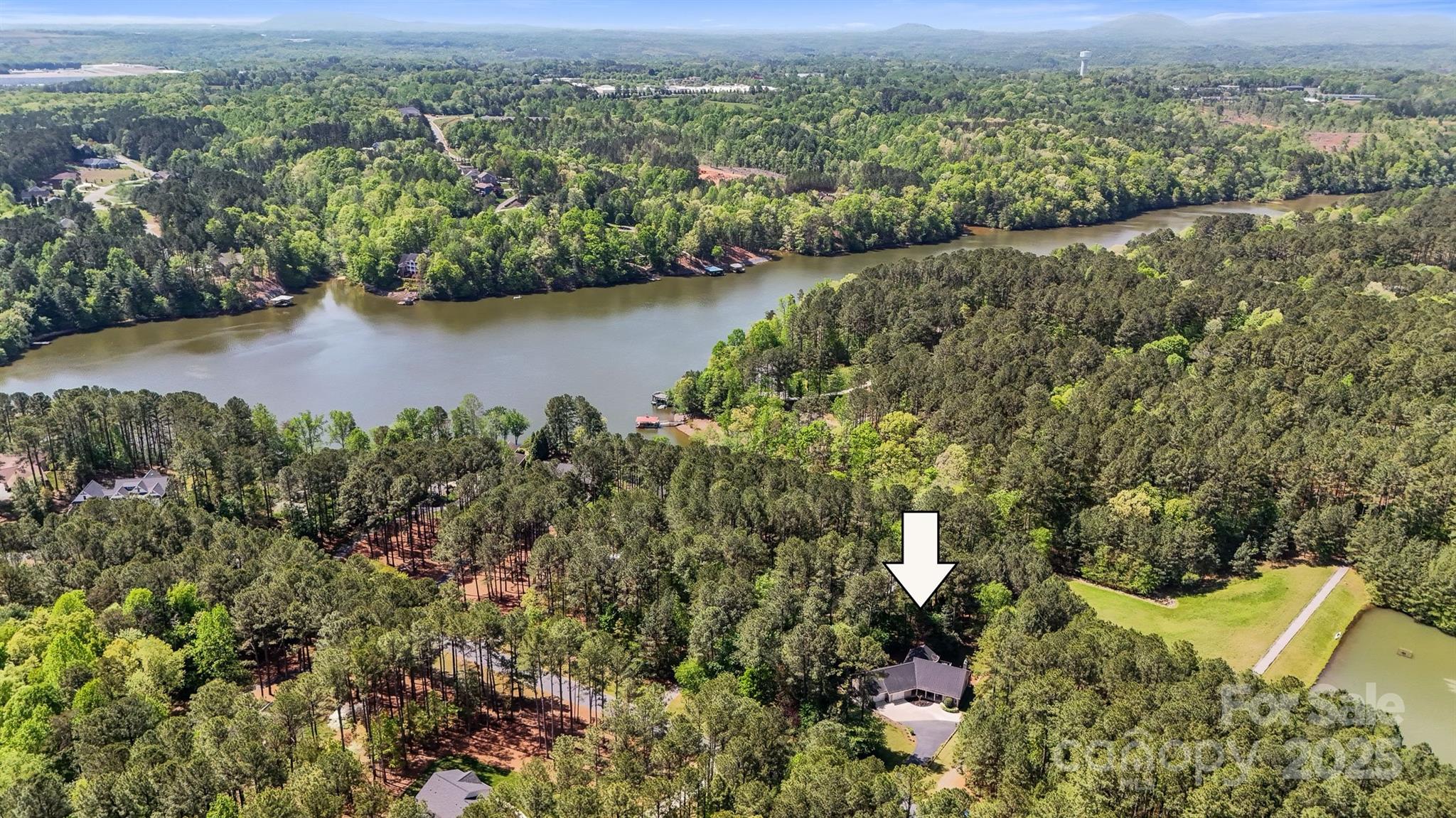 5690 Anchor Drive Granite Falls, NC 28630 - Photo 36 of 48 an aerial view of a house with a yard and lake view