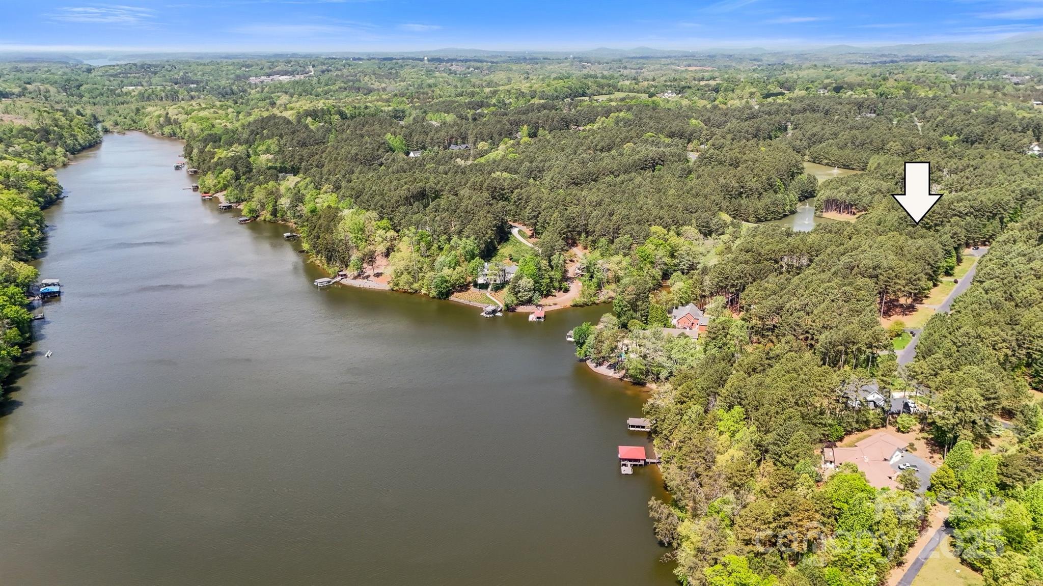 5690 Anchor Drive Granite Falls, NC 28630 - Photo 37 of 48 an aerial view of a house with a yard and lake view