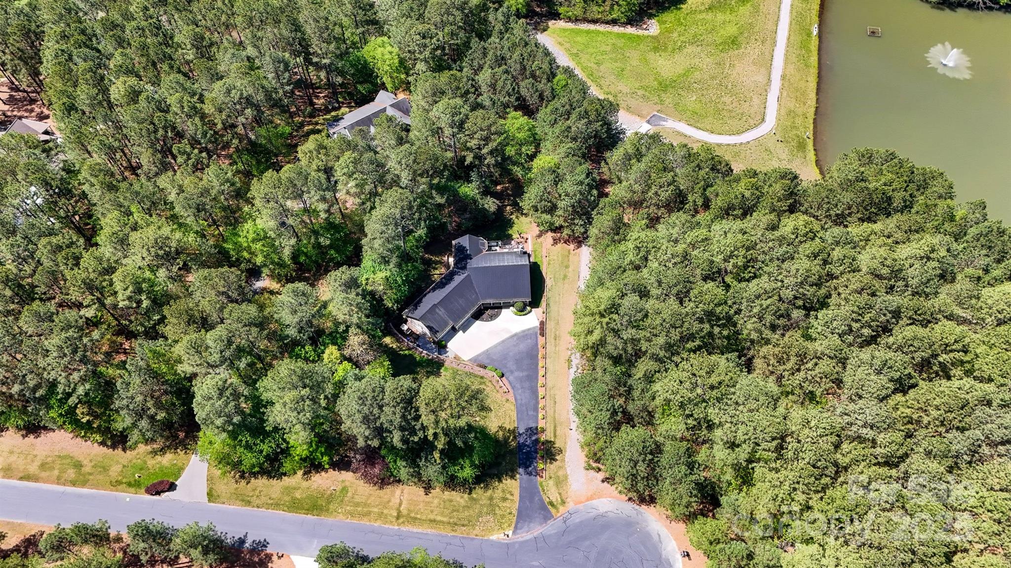 5690 Anchor Drive Granite Falls, NC 28630 - Photo 39 of 48 an aerial view of a house with a yard and trees
