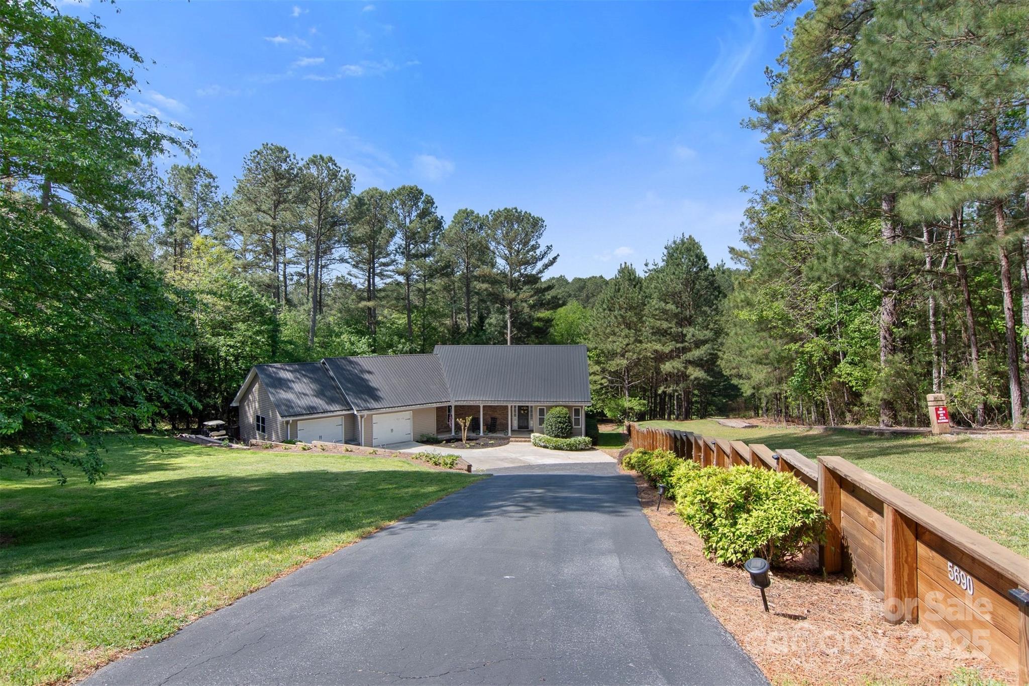 5690 Anchor Drive Granite Falls, NC 28630 - Photo 4 of 48 a view of house with outdoor space and trees