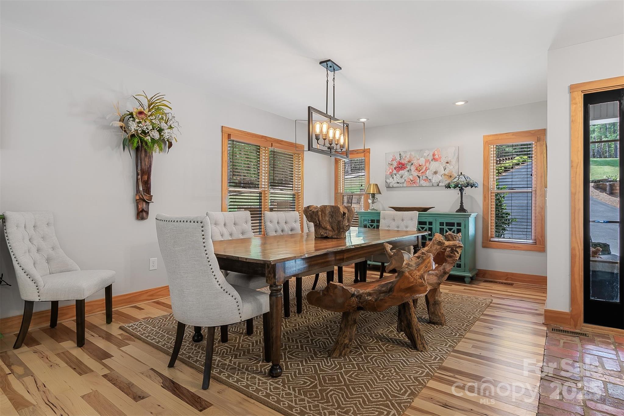 5690 Anchor Drive Granite Falls, NC 28630 - Photo 7 of 48 a view of a dining room with furniture window and wooden floor