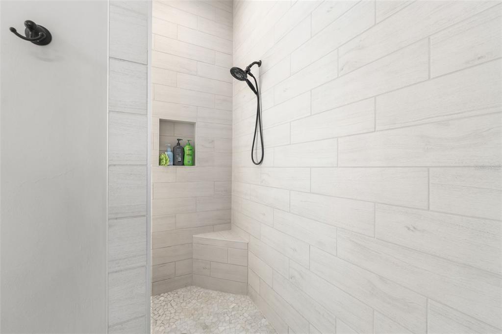 10778 Southwest 34th Road Gainesville, FL 32608 - Photo 15 of 55 a bathroom with a shower