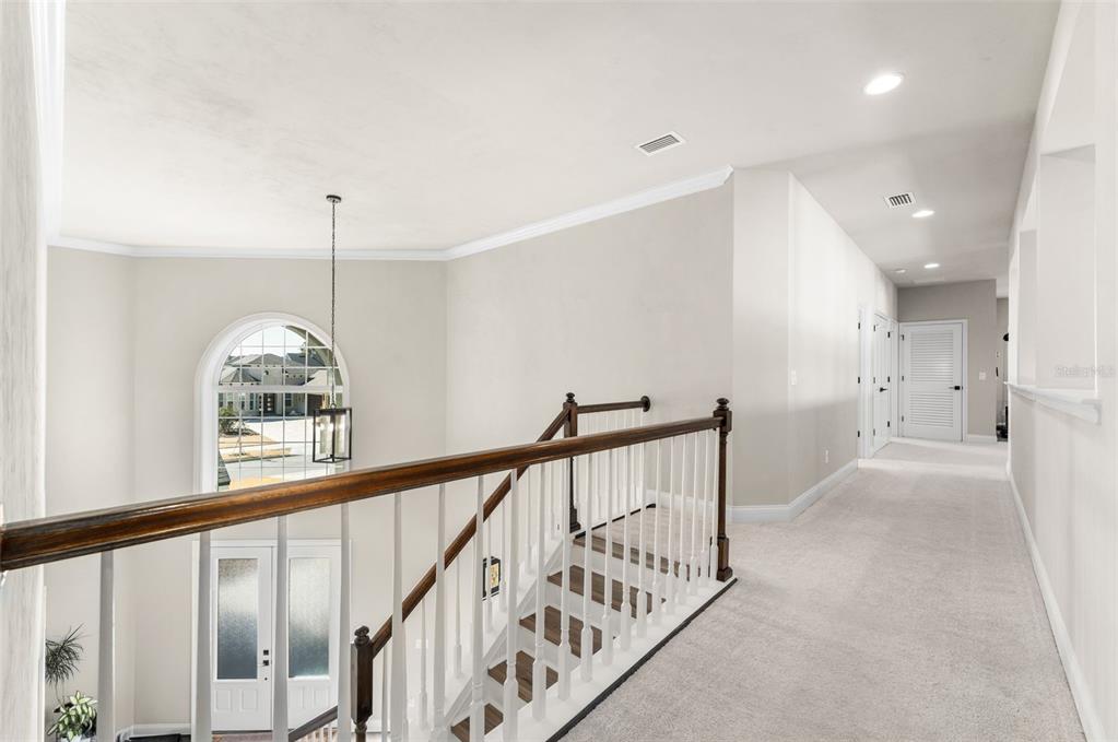 10778 Southwest 34th Road Gainesville, FL 32608 - Photo 22 of 55 a view of staircase with rug