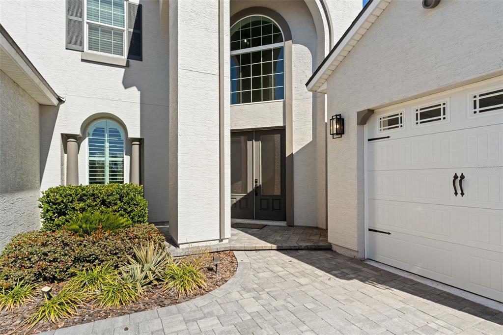 10778 Southwest 34th Road Gainesville, FL 32608 - Photo 3 of 62 a view of a entryway door of the house