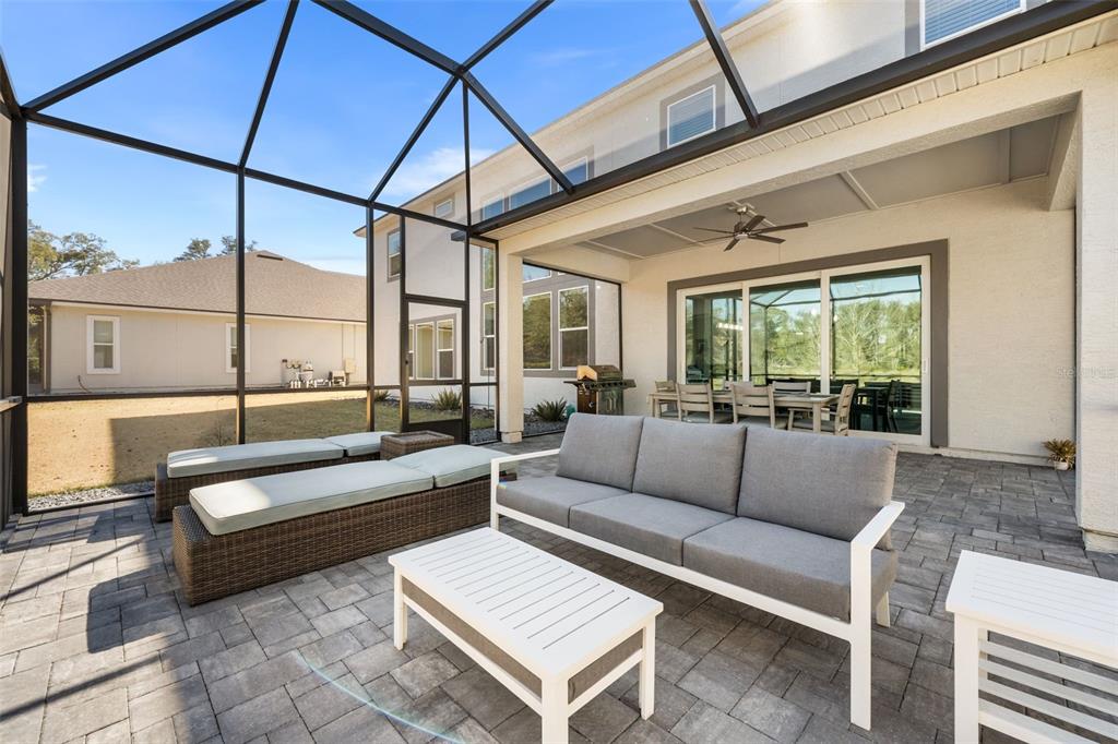 10778 Southwest 34th Road Gainesville, FL 32608 - Photo 45 of 62 a living room with furniture and a large window
