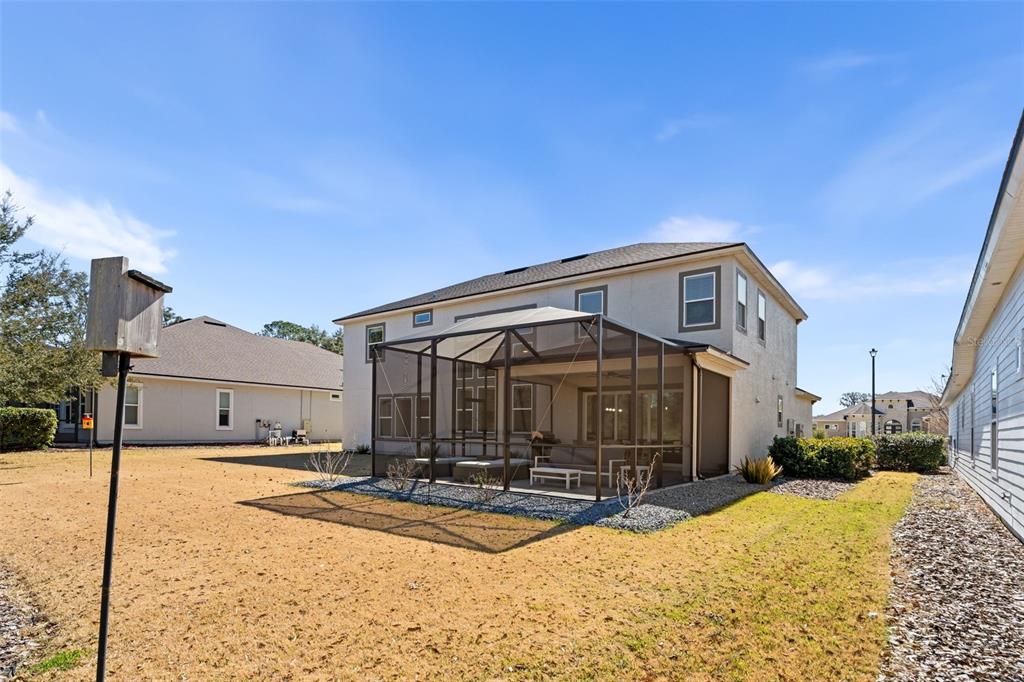 10778 Southwest 34th Road Gainesville, FL 32608 - Photo 49 of 62 a view of a house with snow on the road
