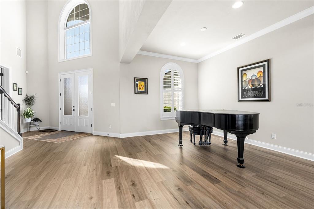 10778 Southwest 34th Road Gainesville, FL 32608 - Photo 7 of 62 a view of a livingroom with furniture and wooden floor