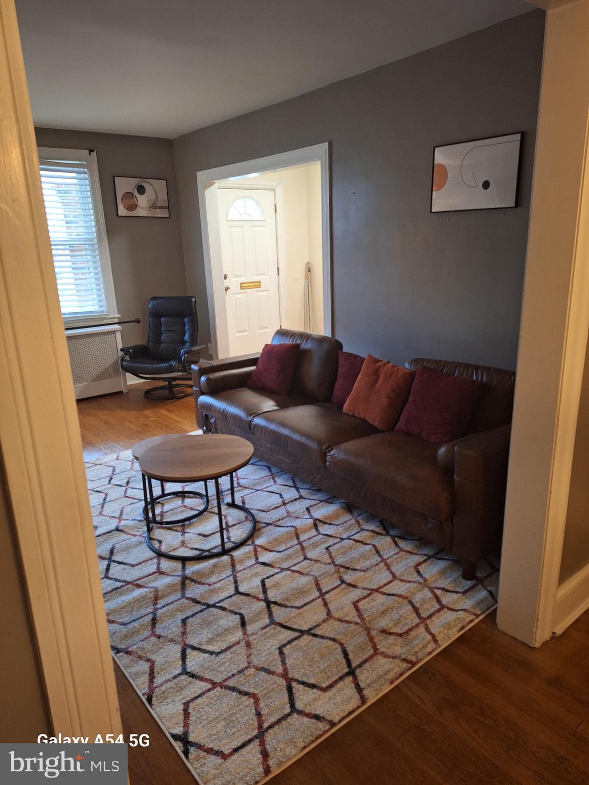 a living room with a couch and a table