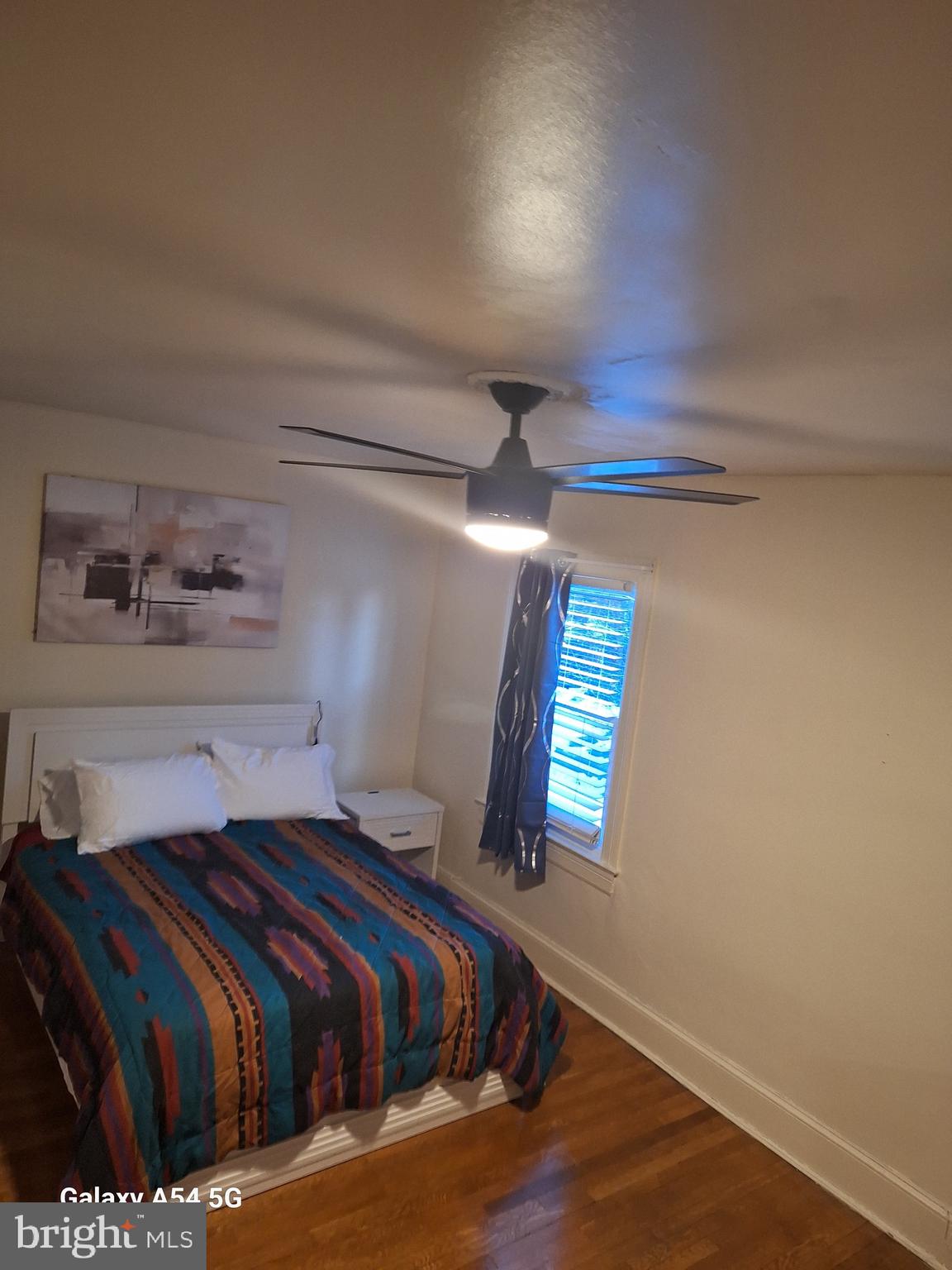 3815 W Street Northwest Washington, DC 20007 - Photo 13 of 13 a bedroom with a bed and a window