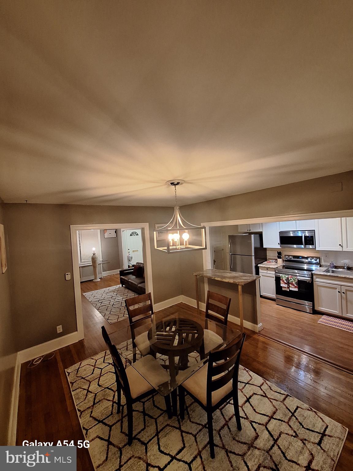 3815 W Street Northwest Washington, DC 20007 - Photo 2 of 13 a view of a dining room with furniture