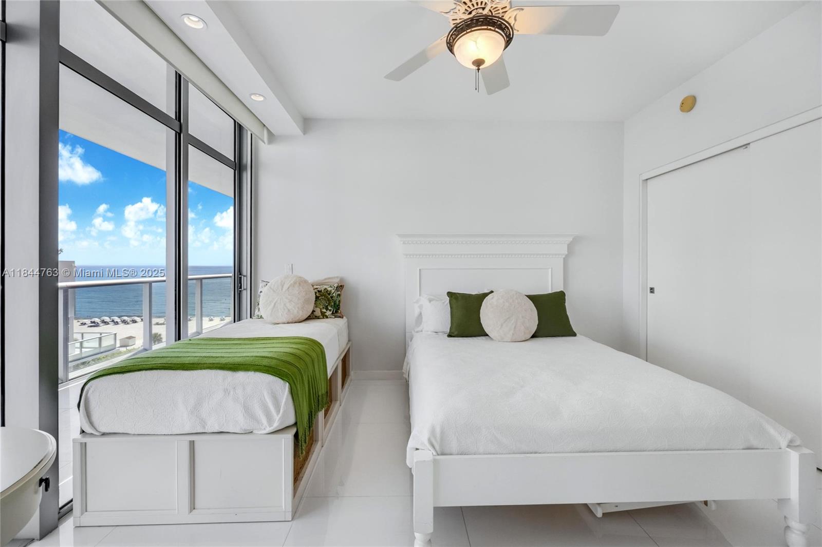 3737 Collins Avenue, Unit S801 Miami Beach, FL 33140 - Photo 18 of 24 a bedroom with a bed and window