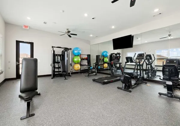 a view of a room with gym equipment