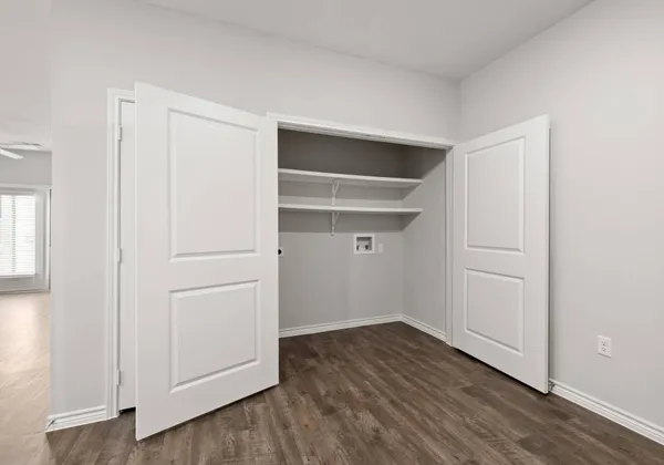a view of an empty walk in closet