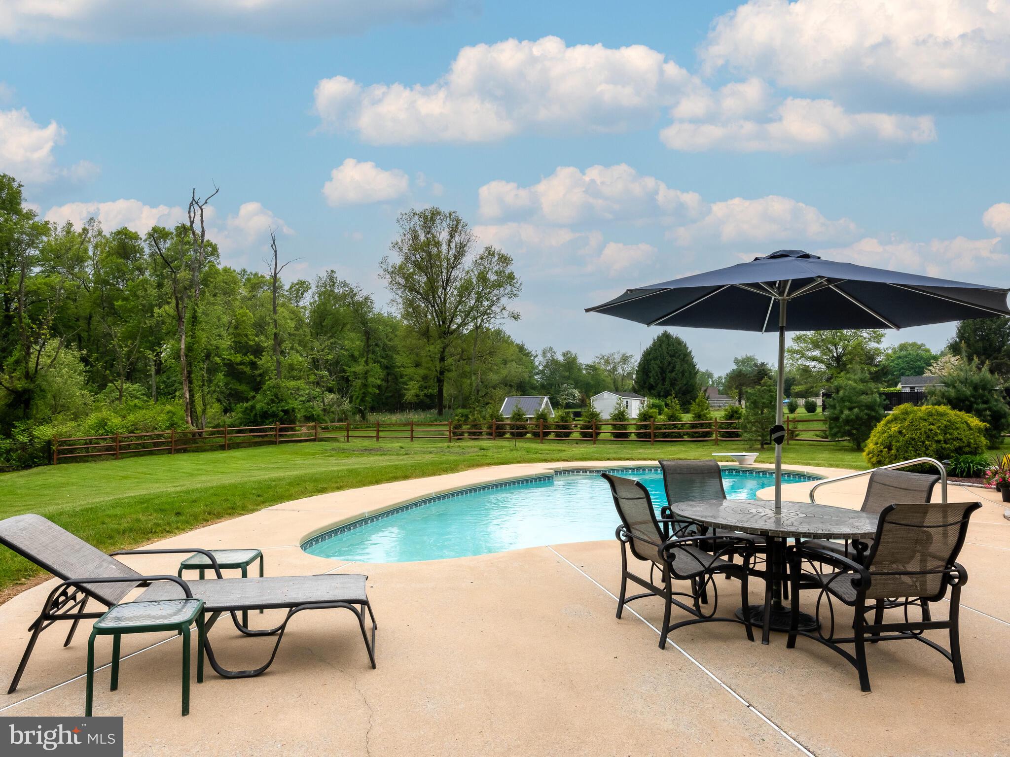 648 East Reeceville Road Coatesville, PA 19320 - Photo 45 of 49 a view of a chairs and table in the patio yard