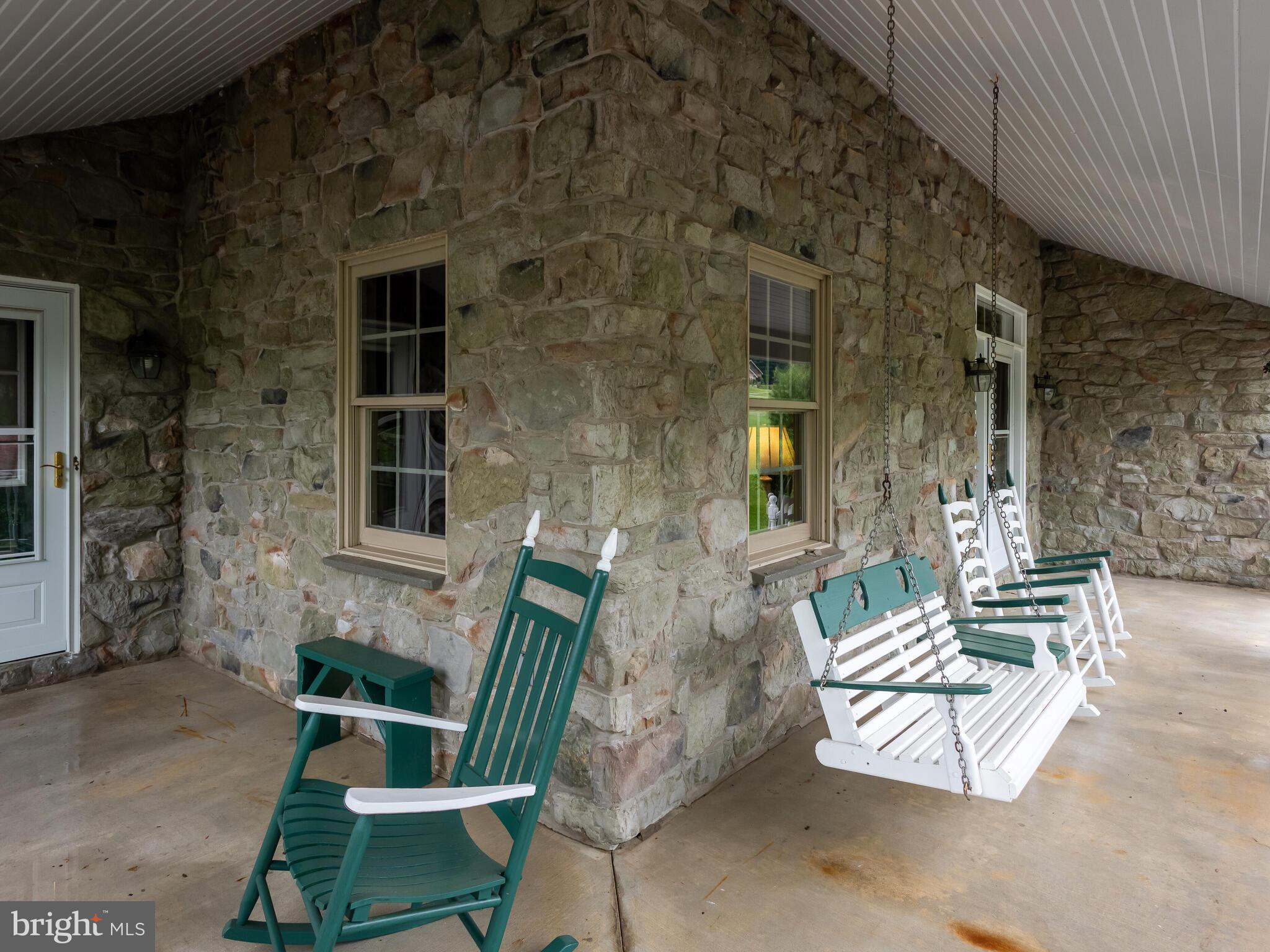 648 East Reeceville Road Coatesville, PA 19320 - Photo 6 of 49 a view of patio with a table and chairs and potted plants