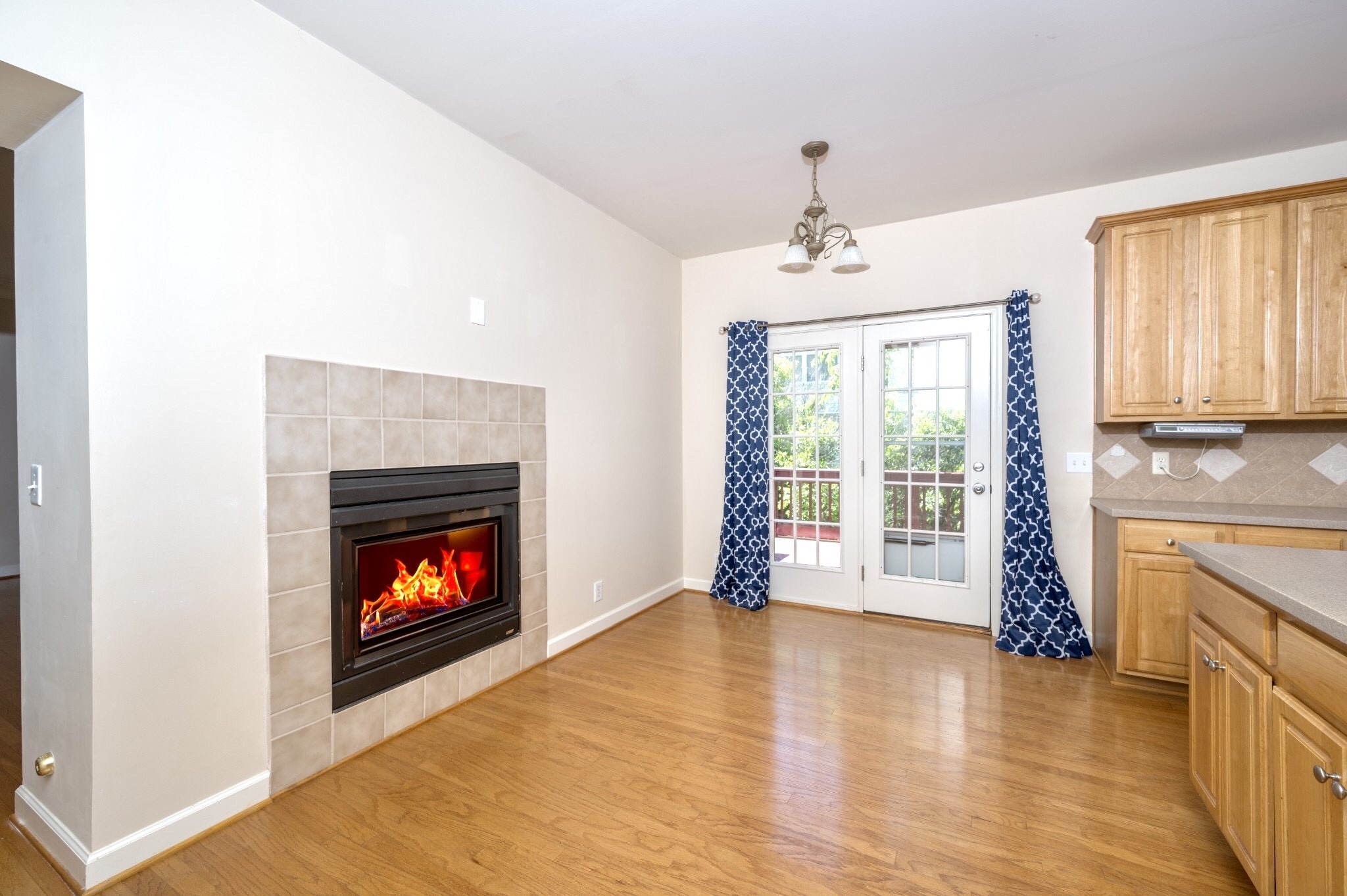 1322 Tilton Drive Franklin, TN 37067 - Photo 18 of 60 a view of an empty room with a fireplace and a window
