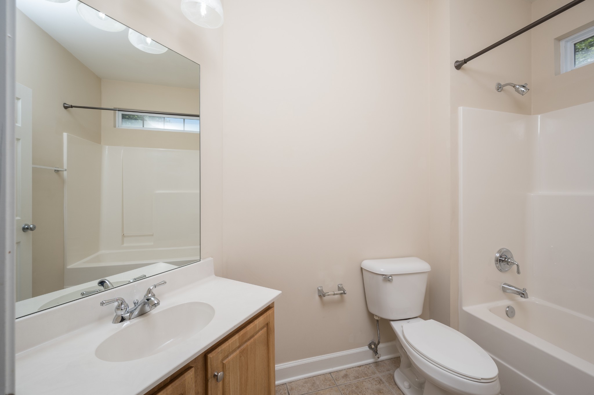 1322 Tilton Drive Franklin, TN 37067 - Photo 20 of 60 a white toilet sitting next to a bathroom sink