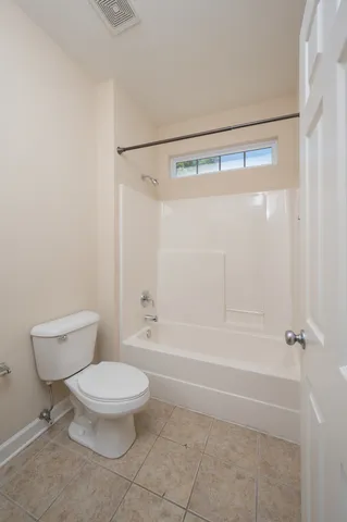 a view of entryway with wooden floor and stairs