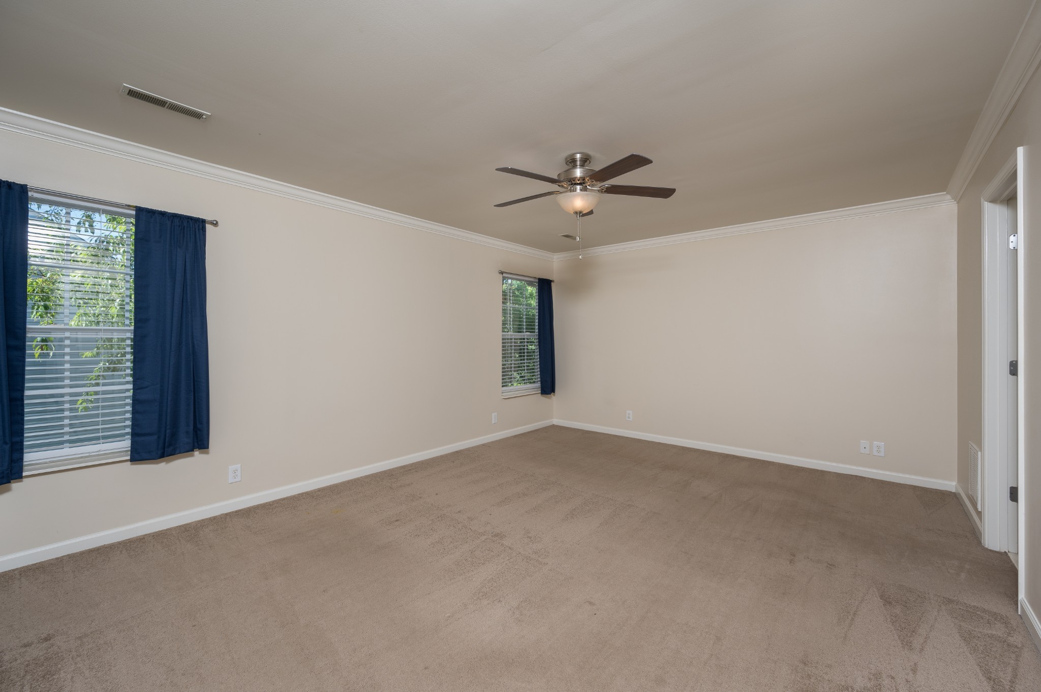 1322 Tilton Drive Franklin, TN 37067 - Photo 27 of 60 an empty room with a window and a ceiling fan