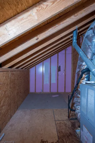 a patio with a table and chairs