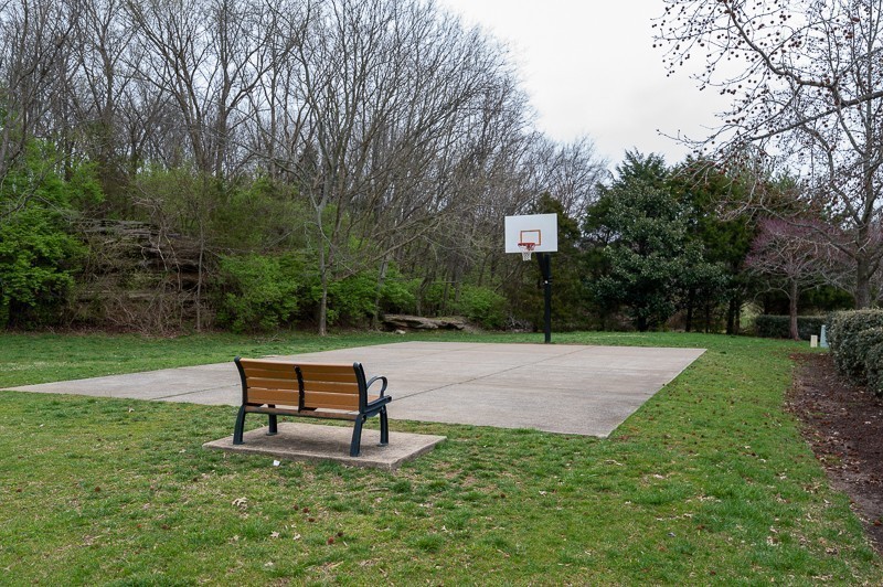 1322 Tilton Drive Franklin, TN 37067 - Photo 58 of 60 a park bench sitting in the middle of a park