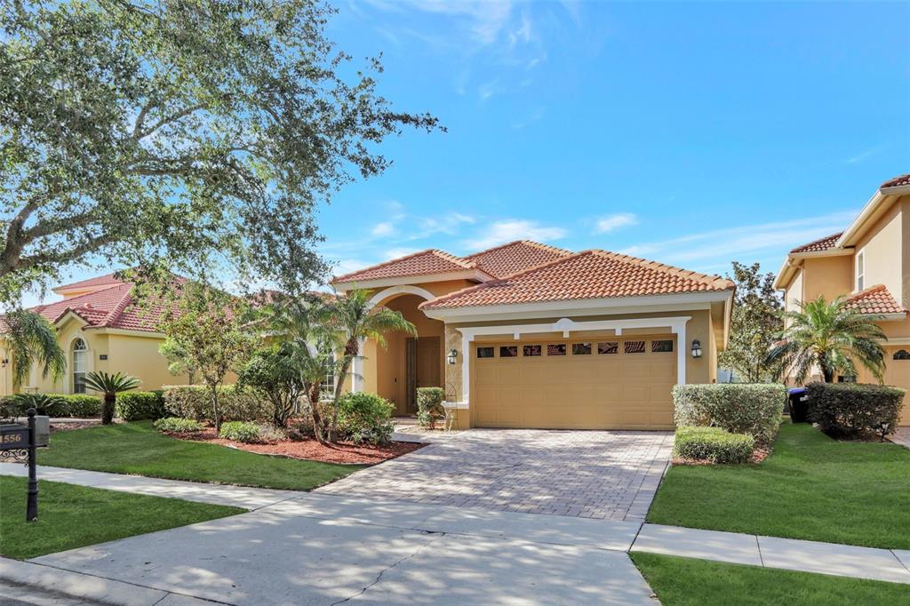 Mediterranean style home with tile roof