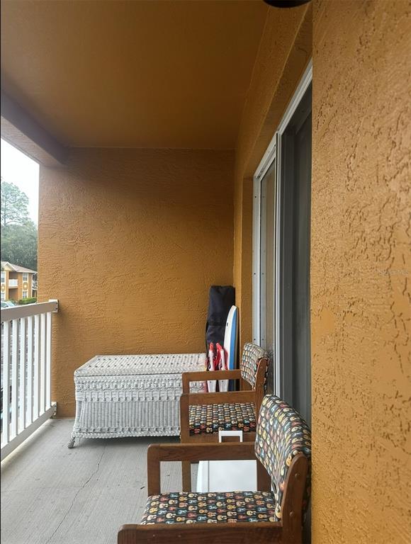 4600 East Moody Boulevard, Unit 3J Bunnell, FL 32110 - Photo 14 of 20 a bedroom with bed and window