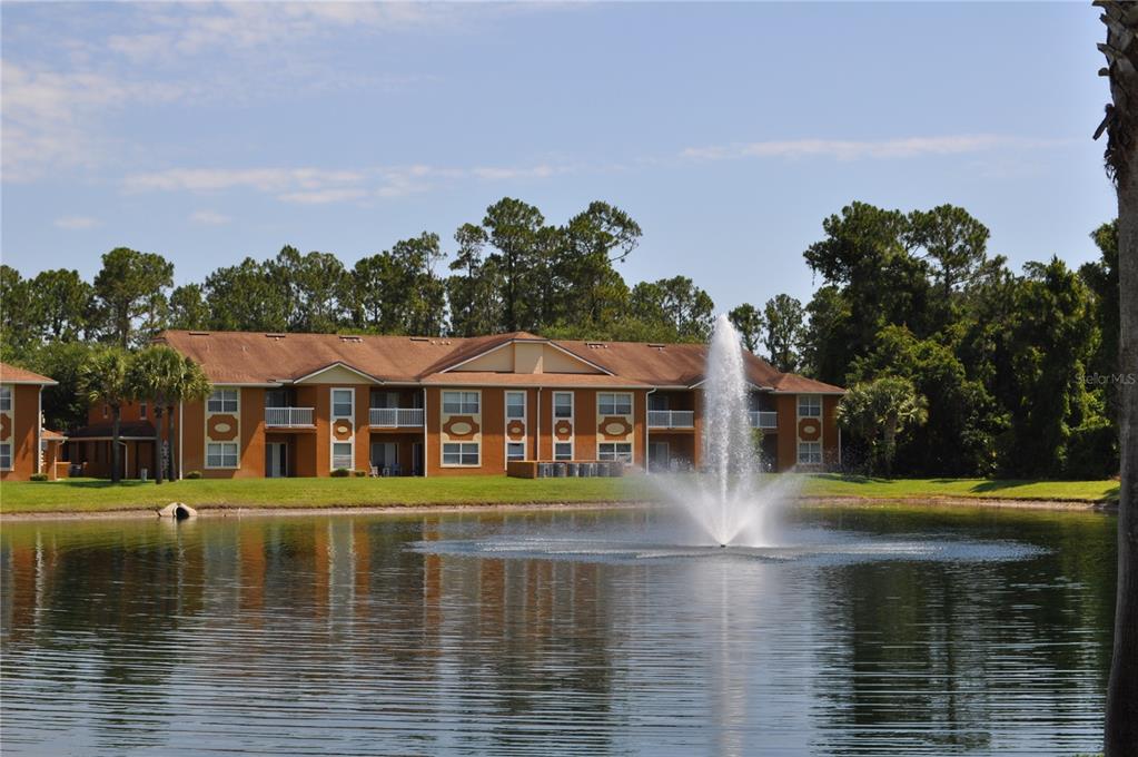 4600 East Moody Boulevard, Unit 3J Bunnell, FL 32110 - Photo 15 of 20 a view of a lake with houses