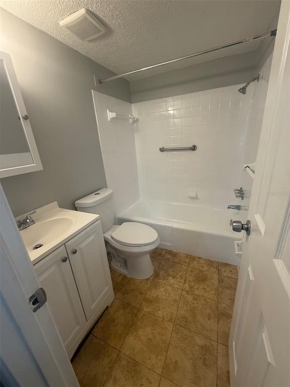 Undisclosed Address Clearwater, FL 33755 - Photo 13 of 13 a bathroom with a granite countertop sink toilet and shower