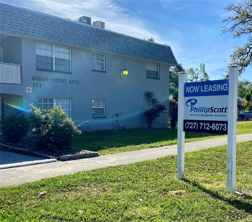 Undisclosed Address Clearwater, FL 33755 - Photo 2 of 13 a sign on the side of a building