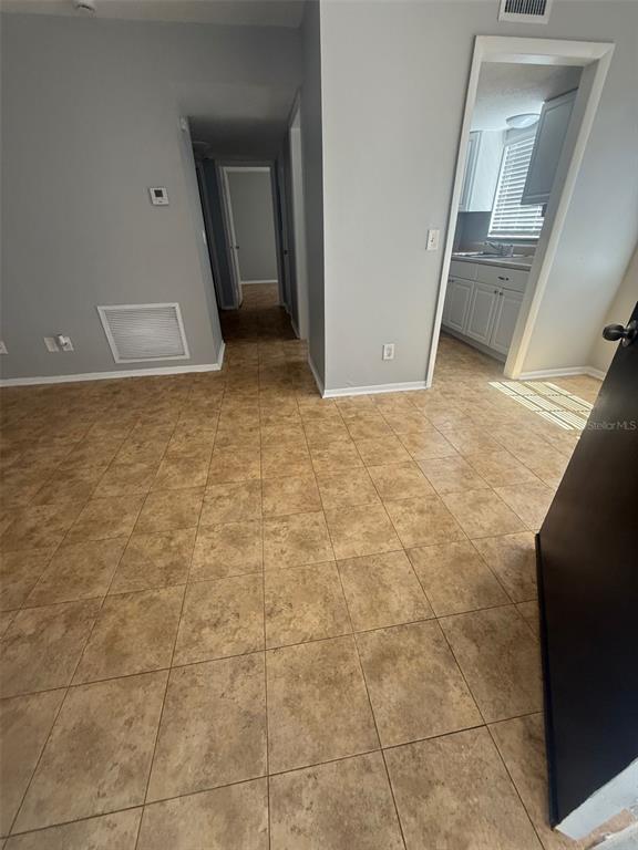 Undisclosed Address Clearwater, FL 33755 - Photo 3 of 13 a view of an empty room