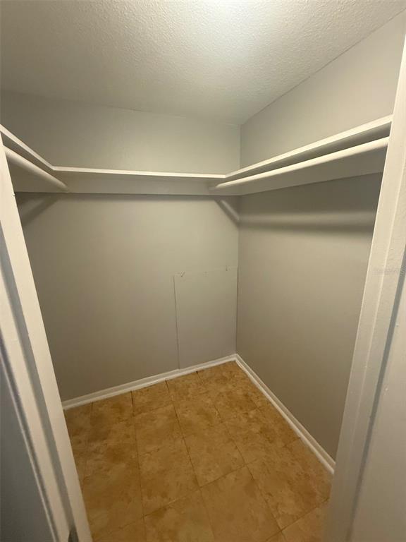 Undisclosed Address Clearwater, FL 33755 - Photo 10 of 13 a view of a room with racks on the wall